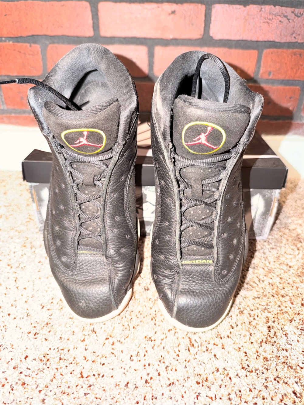 Jordan Black Leather High-Top Sneakers with Red and Yellow Accents - Picture 3 of 6